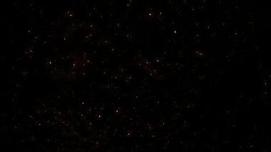 Video düşen parıldıyor. Kırmızı parlak küçük parçacıklar düşme sonucu bazı yangın patlama gibi.