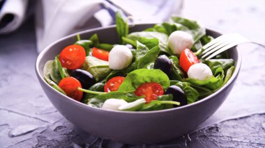 Fresh tomato, olive and mint salad