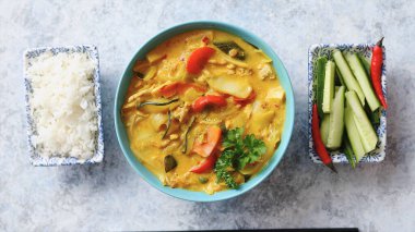 Cooked soup with rice and vegetables