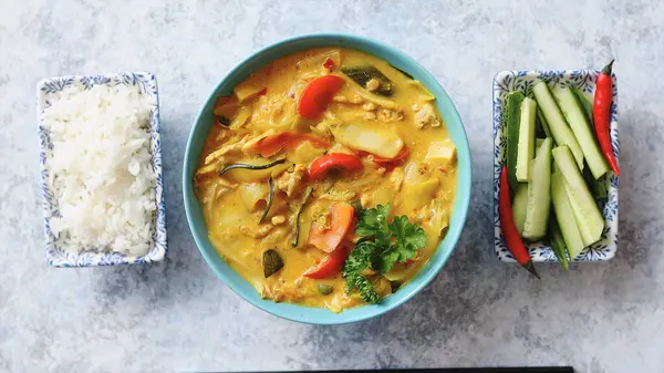 Cooked soup with rice and vegetables