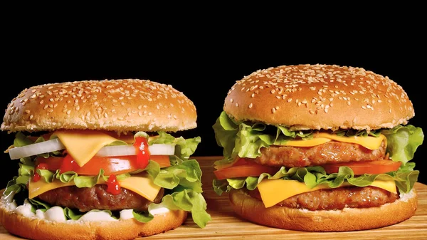 Cooked Two Burgers Background Bun Cutlet Greens — Fotografia de Stock