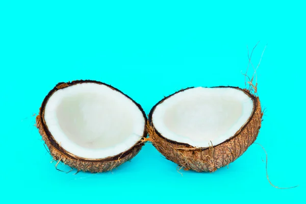 Coconut is split into two parts. — Stock Photo, Image