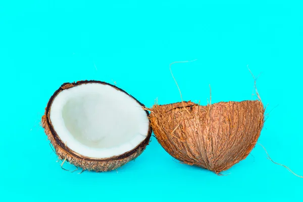 Coconut is split into two parts. — Stock Photo, Image