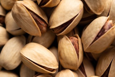 Fındık kabuklu tuzlu şam fıstıklarının makro görüntüsü, yüksek çözünürlüklü şam fıstıkları.