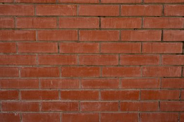 Brick the wall and the background texture. red brick wall getting older from the bottom, The background image of the red brick wall has a beautiful pattern