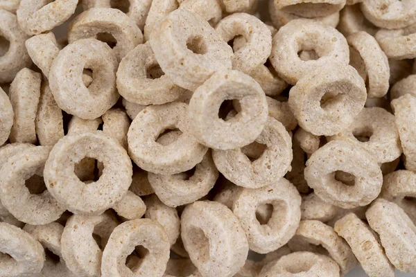 healthy cereal rings on white background Good morning A healthy, healthy breakfast Dry muesli A close up shot of breakfast cereals