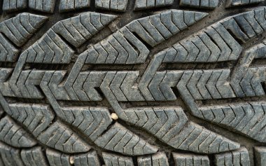 Araba lastiği, araba lastiği arka planı, lastik dokusu, yakın plan.