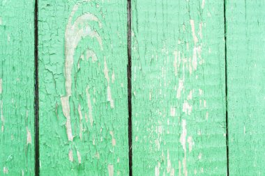 Kirli, bir boyayla boyanmış çekiçle birbirine tutturulmuş eski ahşap kaplama yüzey dokusu düğüm ve çivi delikleriyle