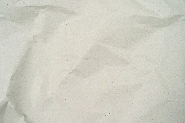 灰色の砕いたクラフトの背景の紙の質感 紙のしわや砕いた 抽象的な質感の白い背景 砕いた再生紙 — ストック写真
