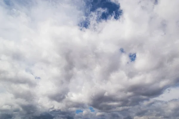 Beautiful clouds in the sky. The cumulus clouds are high in the air.