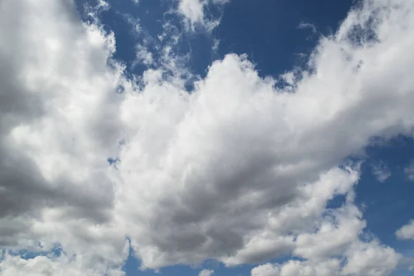 Beautiful clouds in the sky. The cumulus clouds are high in the air.