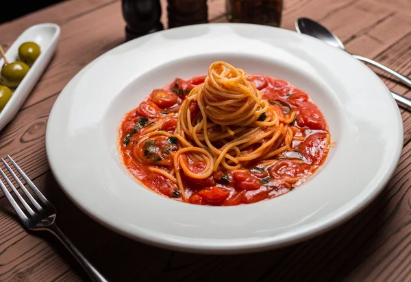 Pasta seafood in tomato sauce with shrimp and tomatoes — Stock Photo, Image