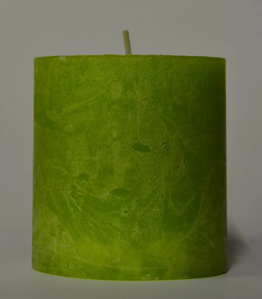 Lime coloured candle — Stok fotoğraf