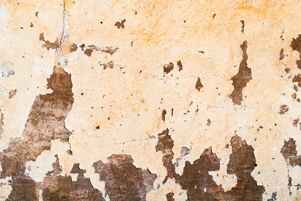 Surface peeling paint peeling off on grungy old wall background