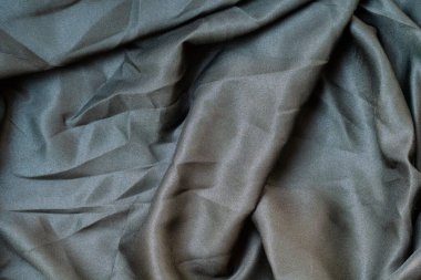 Soyut kumaş dokusunu kapat, buruşuk ya da sıvı dalga kumaş arkaplanı, zarif duvar kağıdı tasarımı