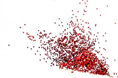 parıltı tozu beyaz arkaplanda ayrılır ya da patlar