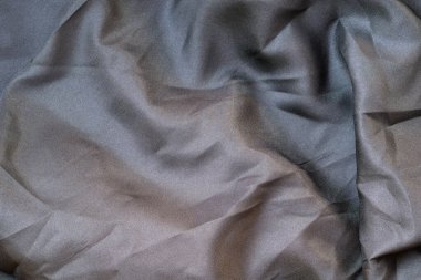 Soyut kumaş dokusunu kapat, buruşuk ya da sıvı dalga kumaş arkaplanı, zarif duvar kağıdı tasarımı