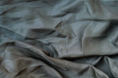 Soyut kumaş dokusunu kapat, buruşuk ya da sıvı dalga kumaş arkaplanı, zarif duvar kağıdı tasarımı