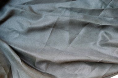 Soyut kumaş dokusunu kapat, buruşuk ya da sıvı dalga kumaş arkaplanı, zarif duvar kağıdı tasarımı