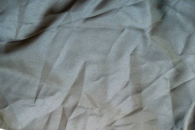 Soyut kumaş dokusunu kapat, buruşuk ya da sıvı dalga kumaş arkaplanı, zarif duvar kağıdı tasarımı