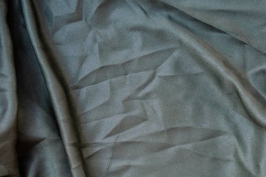 Soyut kumaş dokusunu kapat, buruşuk ya da sıvı dalga kumaş arkaplanı, zarif duvar kağıdı tasarımı