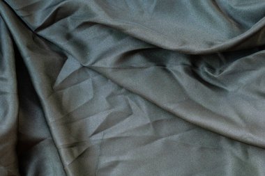 Soyut kumaş dokusunu kapat, buruşuk ya da sıvı dalga kumaş arkaplanı, zarif duvar kağıdı tasarımı