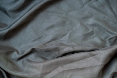 Soyut kumaş dokusunu kapat, buruşuk ya da sıvı dalga kumaş arkaplanı, zarif duvar kağıdı tasarımı