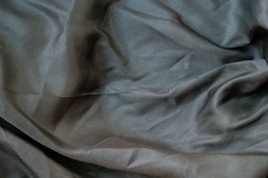 Soyut kumaş dokusunu kapat, buruşuk ya da sıvı dalga kumaş arkaplanı, zarif duvar kağıdı tasarımı