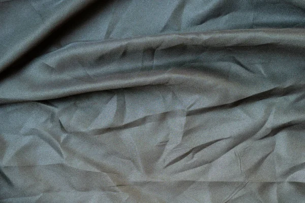 Soyut kumaş dokusunu kapat, buruşuk ya da sıvı dalga kumaş arkaplanı, zarif duvar kağıdı tasarımı