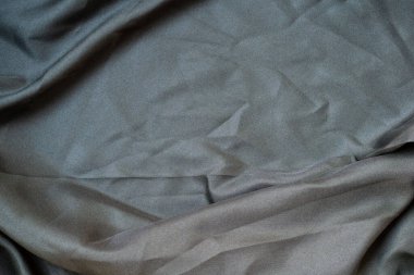 Soyut kumaş dokusunu kapat, buruşuk ya da sıvı dalga kumaş arkaplanı, zarif duvar kağıdı tasarımı