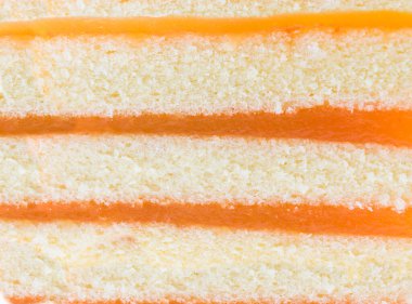 Turuncu pasta arkaplanına yakın plan.