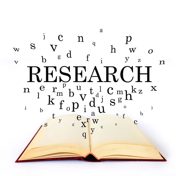 Research, word on the book with letters flying — Stock Photo, Image