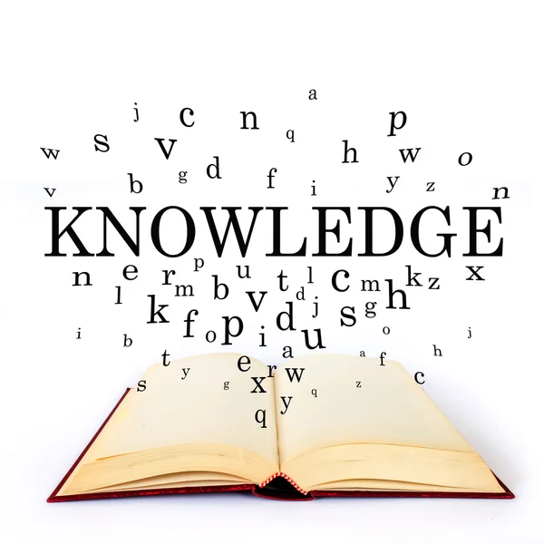 Knowledge, word on the book with letters flying — 스톡 사진
