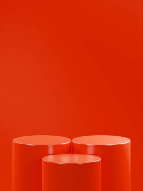 3 kırmızı turuncu podyum tüpü, 1 öndeki tüp arkadaki 2 tüpten daha aşağıda, kırmızı turuncu arka plan. 3 dikey podyum
