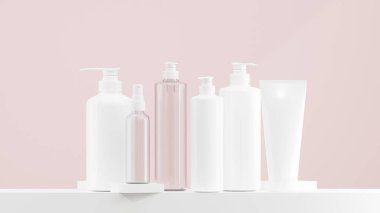 Beyaz losyon, sprey ve pompa şişesi. Beyaz şapkalı temiz losyon şişesi. Değişik boyutlarda losyon şişeleri ilahi pembe arka planda beyaz bir zemine konur.