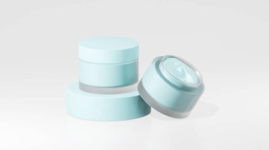 2 paket toz mavi tencere krem şişesi, pudra mavisi podyumda esrar kremi şişeleri, beyaz arka planda izole edilmiş tencere kremi şişeleri.