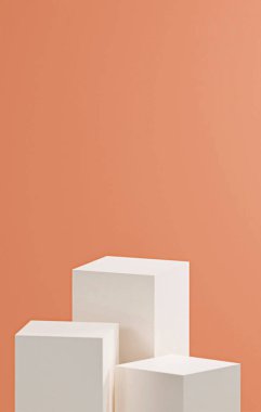 Kumlu kahverengi renkli duvar arkaplanı, farklı boyutlarda üç beyaz küp tabanı, kumlu kahverengi renk paleti, ürün yerleştirme