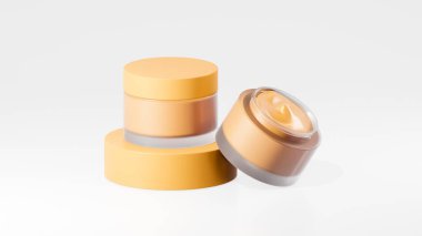 Çift paket sarı turuncu renkli esrar krem şişeleri, sarı turuncu podyumda esrar kremi şişeleri, beyaz arka planda izole edilmiş ot kreması şişeleri.