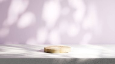 Daire şeklinde ahşap bir podyum, devedikeni olan bir çimento tabanına yerleştirilir. Yaprakların doğal gölgeleriyle aydınlatma.