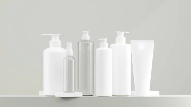 Beyaz losyon şişesi, sprey şişesi, pompa şişesi. Beyaz şapkalı temiz losyon şişesi. Gergedan arkaplanlı çeşitli boyutlarda losyon şişeleri.