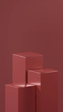 Pas renkleri üzerine farklı boyutlarda 3 küp podyum, pas renkli bir arka planın önünde düzenlenir. Metalik parlak küpler