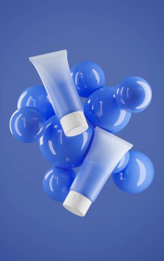 Muhteşem bir görsel çift mat Royal Blue krem tüpleri üzerinde yüzen hassas hava kabarcıkları Kraliyet mavi renginde huzurlu ve ruhani bir atmosfer yaratıyor.