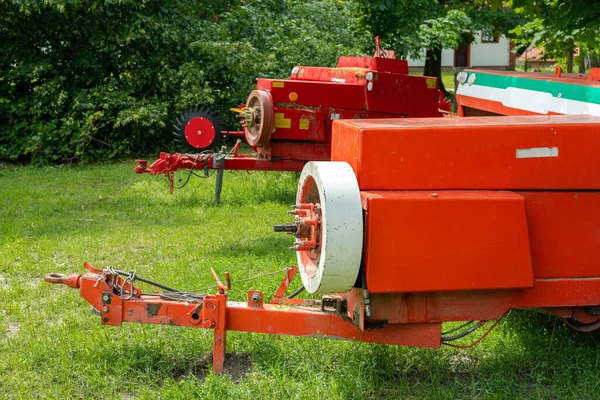 Colorful Agricultural Machinery Rural Equipment Standing Farm Surrounded Trees Sunny — Stock Photo, Image