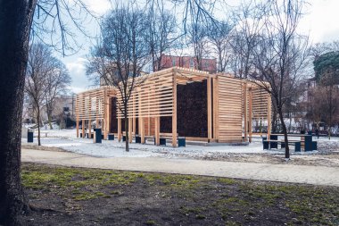 Winter view on graduation tower in Mikolow, Silesia, Poland. Beautiful, wooden building in the park in the middle of the city. 