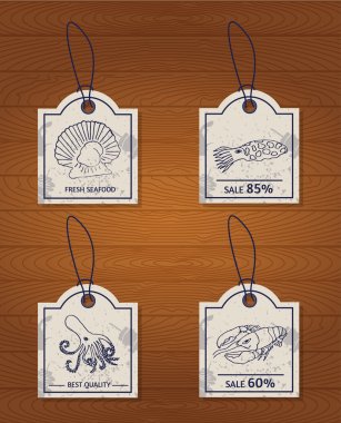 set of 4 vintage design elements seafood: lobster, oyster, scallop, cuttlefish and octopus clipart