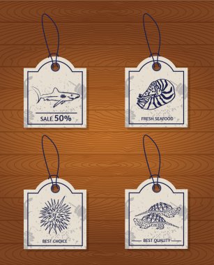et of 4 vintage design elements seafood: shark, Nautilus, sea urchin and the turtle
