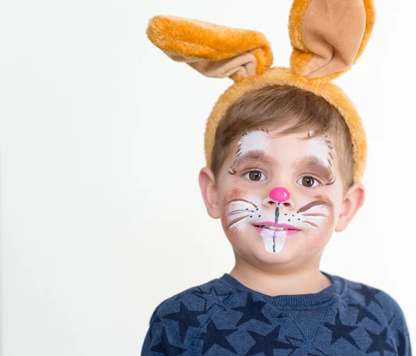 Boy child face painted easter bunny Royalty Free Stock Images