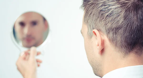 Ego business man reflecting in the mirror — Stock fotografie