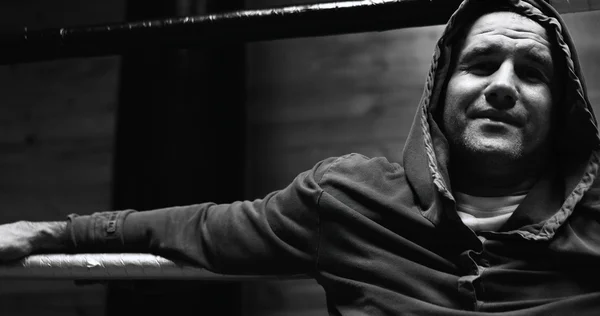 Fighter poses in  ring and training space — Stock Photo, Image