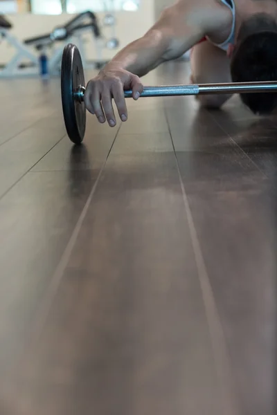 Old iron dumbbells or exercise weights with extra plates on an o — Stock Photo, Image